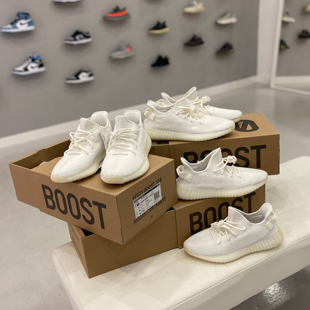 Yeezy triple deals white retail